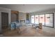 This living room has built-in shelving, a fireplace, and an oversized glass slider to the back yard at 865 Wimbleton Dr, Raleigh, NC 27609