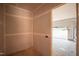 Small, unfinished room next to a garage, ready for customization at 865 Wimbleton Dr, Raleigh, NC 27609