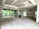 Unfinished living room featuring sliding glass doors and an open floor plan at 708 Catawba St, Raleigh, NC 27609