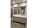 Main bathroom with double vanity and large walk-in shower at 1328 Bessie Ct, Wake Forest, NC 27587