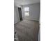 Bright bedroom with carpeted floor and spacious closet at 1328 Bessie Ct, Wake Forest, NC 27587