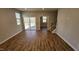 Spacious living room with hardwood floors and sliding glass doors at 1328 Bessie Ct, Wake Forest, NC 27587