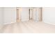 Bright bedroom with neutral walls, carpet flooring, and multiple doorways at 567 Marthas Vw Way, Wake Forest, NC 27587