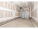 Unfinished two-car garage with concrete floor and block foundation walls, ready for customization at 567 Marthas Vw Way, Wake Forest, NC 27587
