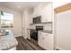 Modern kitchen featuring stainless steel appliances and granite countertops at 567 Marthas Vw Way, Wake Forest, NC 27587