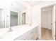 Bathroom with double sinks, mirror, and separate doors to toilet and closet at 569 Marthas Vw Way, Wake Forest, NC 27587