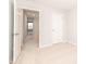 An open bedroom leading to the hallway, showcasing the layout and flow of the home at 569 Marthas Vw Way, Wake Forest, NC 27587