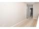 Upstairs hallway with carpet and doorway at 569 Marthas Vw Way, Wake Forest, NC 27587