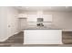 Bright kitchen with granite counters and white cabinets at 569 Marthas Vw Way, Wake Forest, NC 27587