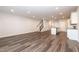 Spacious living room features wood flooring and stairs at 569 Marthas Vw Way, Wake Forest, NC 27587