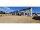 Large backyard with newly installed grass, offering plenty of space at 115 Shooting Star Trl, Youngsville, NC 27596