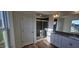Well-lit bathroom featuring a glass shower and double sink vanity with dark countertop at 115 Shooting Star Trl, Youngsville, NC 27596