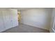 Neutral-toned bedroom with a large closet for plenty of storage at 115 Shooting Star Trl, Youngsville, NC 27596