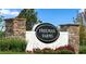 An attractive community signage for 'Freeman Farms' surrounded by beautifully landscaped grounds at 115 Shooting Star Trl, Youngsville, NC 27596