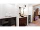 Stylish bathroom features a vessel sink, granite countertops, and decorative cabinets for storage at 1800 Bay Meadow Ct, Raleigh, NC 27615