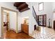 Entryway featuring a staircase and unique cabinet at 1800 Bay Meadow Ct, Raleigh, NC 27615