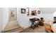 Hallway with a built-in bar area featuring stone countertop, shelving and elegant decor at 1800 Bay Meadow Ct, Raleigh, NC 27615