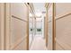 A bright hallway showcases custom closet doors with mirrors, and access to other rooms at 1800 Bay Meadow Ct, Raleigh, NC 27615