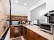 Cozy kitchenette featuring stainless steel appliances, sleek countertops, and ample storage space at 1800 Bay Meadow Ct, Raleigh, NC 27615