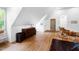 Bright living area with hardwood floors, pitched ceiling and ample space for relaxing and entertaining at 1800 Bay Meadow Ct, Raleigh, NC 27615