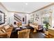 Inviting living room with comfortable seating, stylish decor, and an open view of the staircase at 1800 Bay Meadow Ct, Raleigh, NC 27615