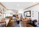 Living room with hardwood floors, a fireplace, and elegant furnishings at 1800 Bay Meadow Ct, Raleigh, NC 27615