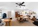 Spacious living area with a ceiling fan, tables, and elegant furnishings perfect for relaxation and entertainment at 1800 Bay Meadow Ct, Raleigh, NC 27615