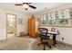 Bright and sunny office with views, a work area and a comfortable chair at 1800 Bay Meadow Ct, Raleigh, NC 27615