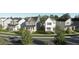 Aerial view of charming new homes with tree-lined streets and lush landscaping at 912 Allen Park Dr, Raleigh, NC 27604