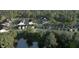 Aerial view of homes surrounding a lake at 912 Allen Park Dr, Raleigh, NC 27604