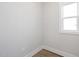A cozy room features neutral walls, one window, and wood-look flooring at 912 Allen Park Dr, Raleigh, NC 27604