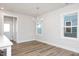 Dining room with hardwood floors and chandelier at 912 Allen Park Dr, Raleigh, NC 27604