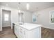 Modern kitchen with white cabinets and island at 912 Allen Park Dr, Raleigh, NC 27604