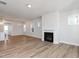 Spacious living room with fireplace and hardwood floors at 912 Allen Park Dr, Raleigh, NC 27604