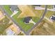An aerial view showcasing a house's location within a residential neighborhood at 25 Cotton Fields Ln # 29, Fuquay Varina, NC 27526
