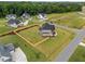 Beautiful new home with a spacious, well-manicured lawn enclosed by a stylish wooden fence for privacy at 25 Cotton Fields Ln # 29, Fuquay Varina, NC 27526