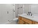 Bathroom features a walk-in shower, modern vanity, and white tile at 25 Cotton Fields Ln # 29, Fuquay Varina, NC 27526