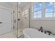 Bathroom featuring a soaking tub and a walk-in shower at 25 Cotton Fields Ln # 29, Fuquay Varina, NC 27526