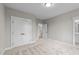 Bedroom with double doors to closet and access to hallway at 25 Cotton Fields Ln # 29, Fuquay Varina, NC 27526