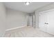 Bright bedroom featuring double doors to closet and access to bathroom at 25 Cotton Fields Ln # 29, Fuquay Varina, NC 27526