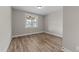 A simple bedroom with a window allows for natural light to fill the space at 25 Cotton Fields Ln # 29, Fuquay Varina, NC 27526