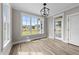 Bright dining room with large windows and access to the outdoor deck at 25 Cotton Fields Ln # 29, Fuquay Varina, NC 27526