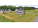 Charming home with a large, fenced yard and well-manicured landscaping at 25 Cotton Fields Ln # 29, Fuquay Varina, NC 27526