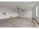 Spacious two-car garage with ample storage space and an automatic garage door at 25 Cotton Fields Ln # 29, Fuquay Varina, NC 27526