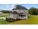 Two-story house exterior with screened porch at 25 Cotton Fields Ln # 29, Fuquay Varina, NC 27526