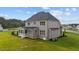 Two-story house with screened porch and landscaped yard at 25 Cotton Fields Ln # 29, Fuquay Varina, NC 27526