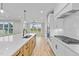 Modern kitchen features stainless steel appliances and white cabinetry at 25 Cotton Fields Ln # 29, Fuquay Varina, NC 27526