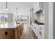 The kitchen features a large island with a sink and modern appliances throughout the space at 25 Cotton Fields Ln # 29, Fuquay Varina, NC 27526