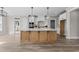 This kitchen features a large center island, modern appliances and finishes, and a classic design at 25 Cotton Fields Ln # 29, Fuquay Varina, NC 27526