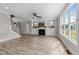 Open-concept living space with fireplace, built-in cabinets, and natural light at 25 Cotton Fields Ln # 29, Fuquay Varina, NC 27526